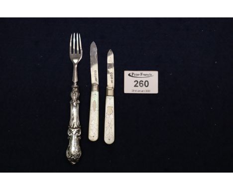 Two silver bladed mother of pearl fruit knives and a silver handled pickle fork. (3)(B.P. 24% incl. VAT)