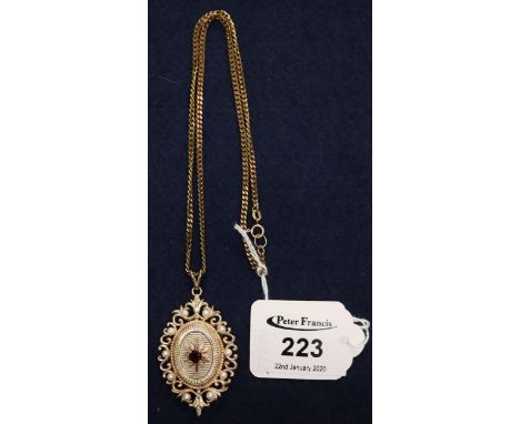 9ct gold pearl and garnet locket, 17.5g approx. (B.P. 24% incl. VAT) CONDITION REPORT: Chain marked: 9KTOverall good conditio