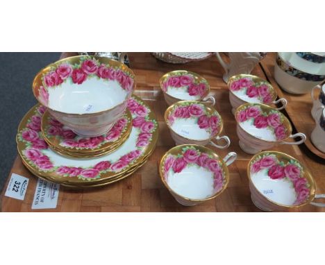 Fifteen piece Shelley porcelain rose design part teaset to include; six cups, three plates, five cake plates and a sugar bowl