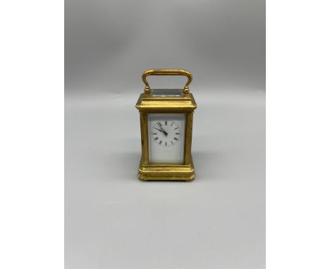 Miniature carriage clock, original platform, 10 cm x 5 cm x 4.5cm.