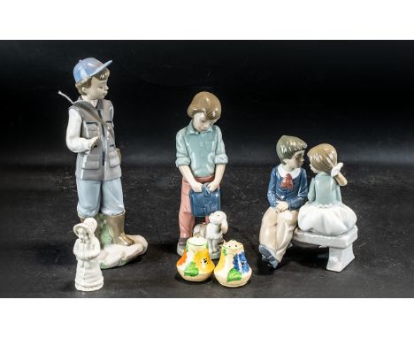 Three Nao Figures, comprising 'First Love' a young boy and girl seated on a bench, No. 1136 7" tall.  'Boy with Dog & Backpac