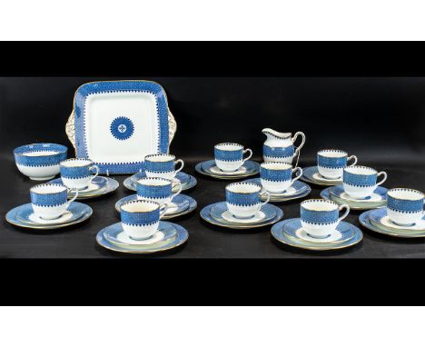 Wedgwood Tea Service, Lynn Pattern No. X8784, comprising milk jug, sugar bowl, 12 cups (one cracked), 12 saucers and 12 side 