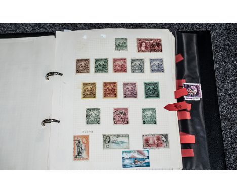 Black Two Ring Stamp Album with superb collection of British Commonwealth stamps. Whilst some are in poor condition, others a