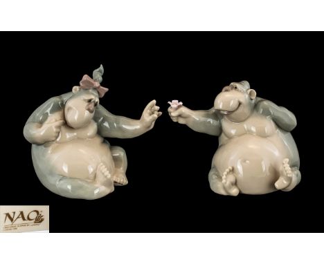 Nao by Lladro - Uncommon Hand Painted Pair of Porcelain Novelty Figures In the Form of Large Ape Figures, One Wearing a Ribbo