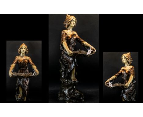 Large Cold Painted Terracotta Figure, in the style of Friedrich Goldscheider, Austria, depicting an Art Nouveau Lady holding 