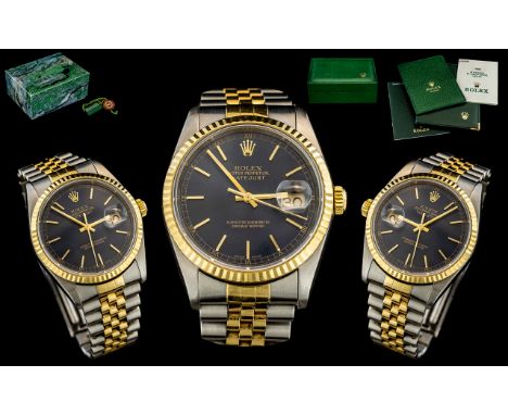 Rolex - Oyster Perpetual Gents 18ct Gold and Steel Superlative Chronometer Date-Just Wrist Watch. Model No 16233. Features a 