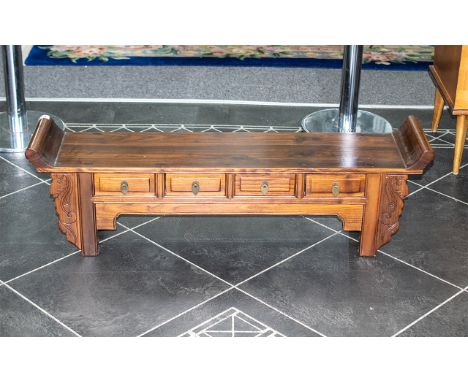 Chinese Kang Side Cabinet of traditional form, with four artist's drawers to the front, with side carved 'ears' and a scroll 