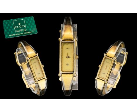 Gucci - Ladies Signed Gold on Steel Fashion Watch. Model No 1500. With Original Display Box, Serial Num 0062858. Receipt, War