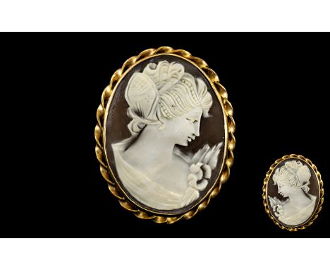 Mid 20th Century Nice Quality 9ct Gold Mounted Shell Cameo Brooch, With Ornate Twist Border of Oval Form. Fully Hallmarked fo