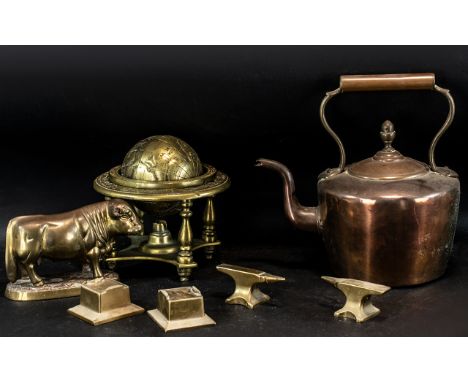 Collection of Metalware to include a brass model of a bull, a brass globe, two brass anvils and a copper tea pot.