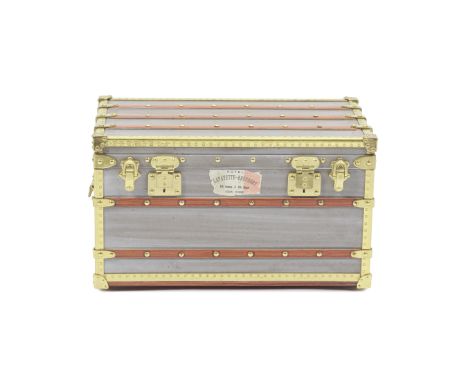 Louis Vuitton: a Mini Malle Zinc 1899 Trunk Paperweight2000Modelled realistically in zinc style finish with gold trim Conditi