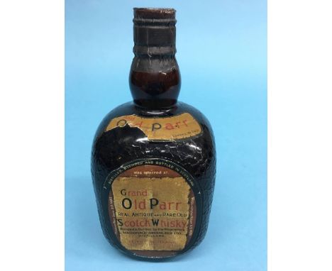 A bottle of Grand Old Parr Scotch Whiskey, contents 26.5 ounces, circa 1960s