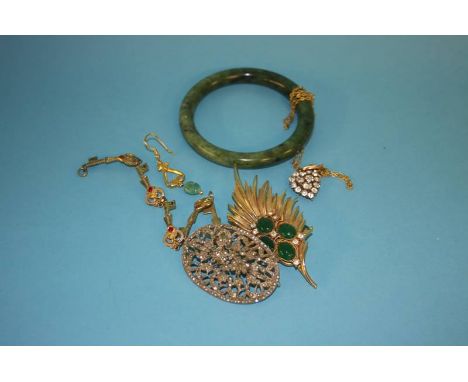 A Jade bangle, a heart shaped pendant, brooches etc.