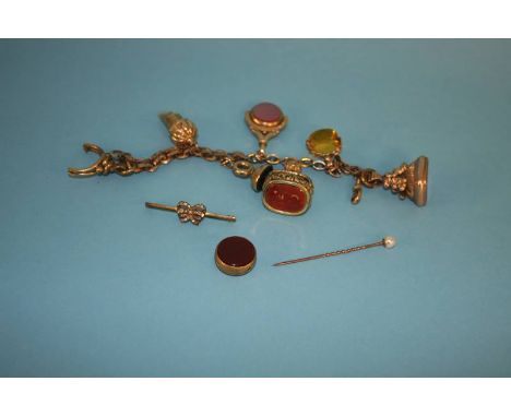 A 9ct gold bar brooch, a seed pearl stick pin and a yellow metal bracelet with fobs, various