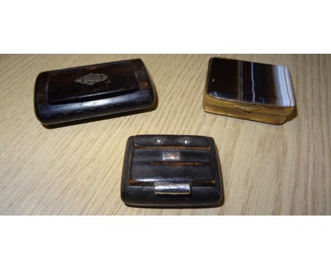 A small case shaped leather Snuff Box, another and a gilt metal snuff box with an agate cover. 