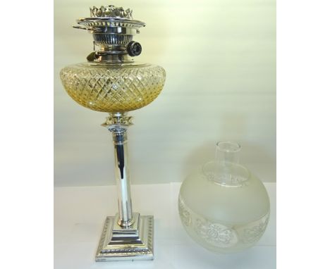 A silver column table Oil Lamp with fluted stem square stepped base and cut glass reservoir with etched glass shade, Sheffiel