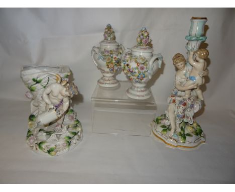 A 20th Century German porcelain figural Candlestick with crossed swords mark, 11" (28cms) high, a Sitzendorf vase and a pair 