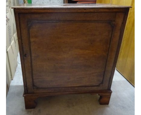 An early 19th Century mahogany Cupboard enclosed by single panel door on bracket feet.  2' 8" (81cms) wide.