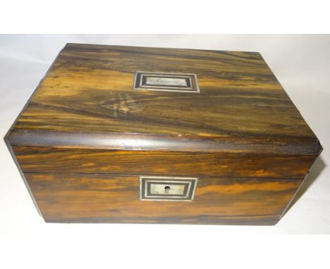 A Victorian coromandel Sewing Box inset with a mother or pearl panel inscribed Annie, the interior fitted with a lift out tra