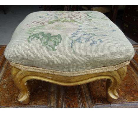 A square gilt frame Foot Stool with tapestry upholstered top and shape supports.