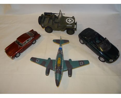 A Danbury Mint 1-24 scale 1964 Aston Martin DB5 metallic red, also a Danbury Mint World War II Jeep replica MB1 1994, a Corgi