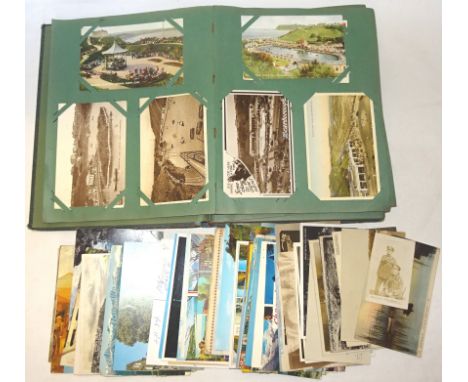A Vintage Postcard Album and contents of topographical views, including 'The Wreck of the North Pier, Scarborough', 'Record W