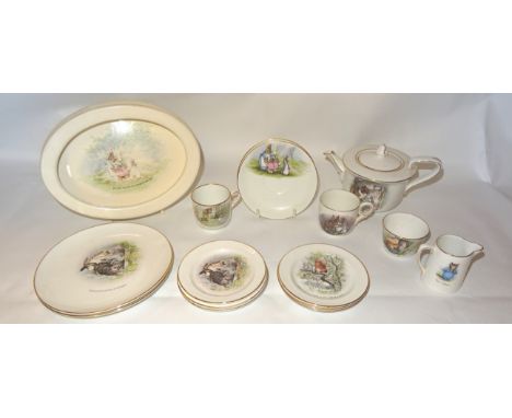 A Grimwades Beatrix Potter Nursery Teaset comprising two cups and saucers, six tea plates, two larger plates, teapot, milk ju