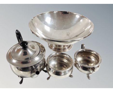 A silver plated pedestal bowl and three piece tea service  