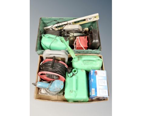 Two boxes of power tools, extension reel, fuel cans, spirit level 