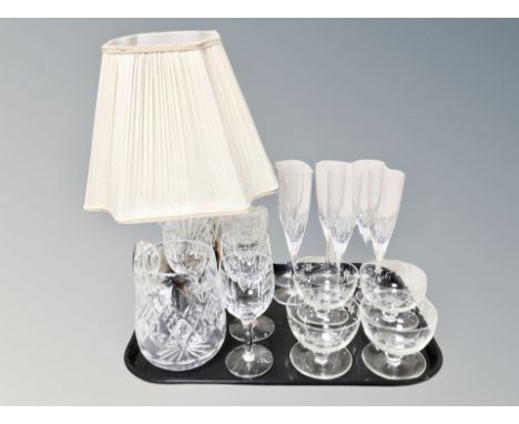 A collection of crystal, table lamp, champagne flutes etc (17)