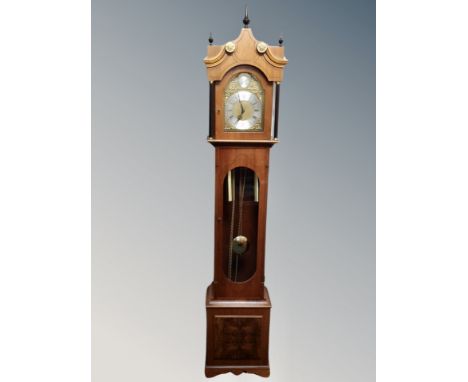 A reproduction Tempus Fugit longcase clock with pendulum and weights 