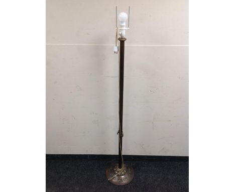 A metal floor lamp with continental wiring 