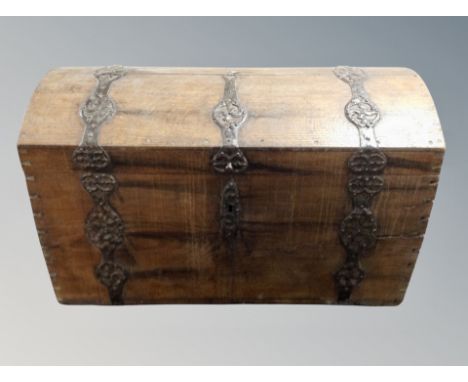 A 19th century oak and wrought iron mounted domed shipping trunk, width 118 cm 