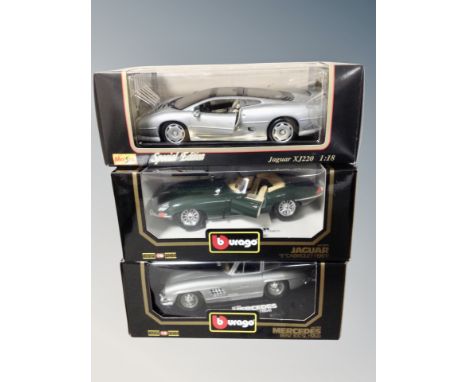 Two boxed Burago die cast vehicles 1/18 scale - Jaguar E Cabriolet and Mercedes Benz SL together with Maesto die cast Jaguar 