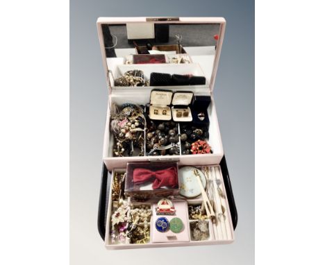 A contemporary lift out jewellery chest containing costume jewellery, faux pearls, compact, cufflinks, silver gemset ring 