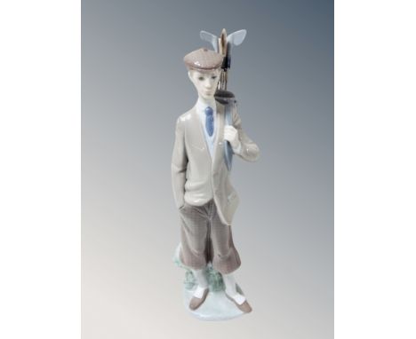 A Lladro figure of a golfer 