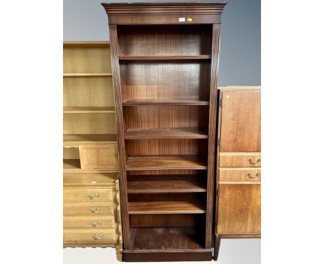 A reproduction mahogany open bookcase, width 81 cm 