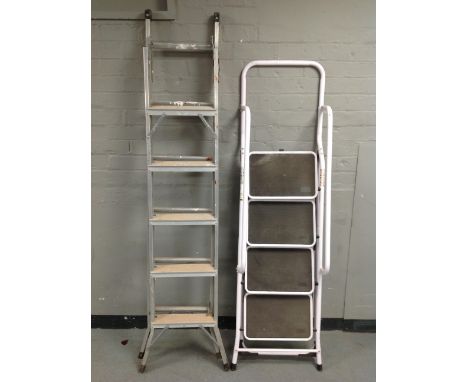 An aluminium step ladder and four tread folding ladder 