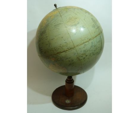 Globe on wooden mount, the circular base inset with a compass, the globe entitled "The Philips Challenge Globe" made by Georg