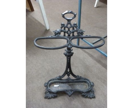 Victorian cast iron stick stand of foliate form fitted with removable drip tray, 76cm high