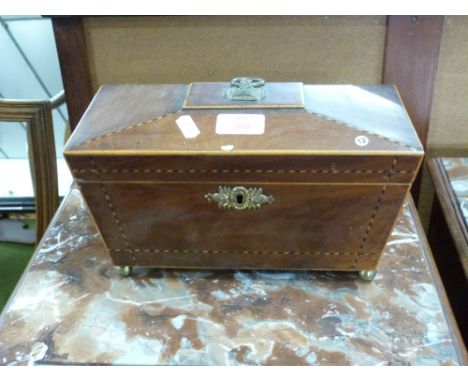 19th century mahogany and inlaid sarcophagus formed tea caddy, the hinged lid opening to a fitted interior, raised on small b