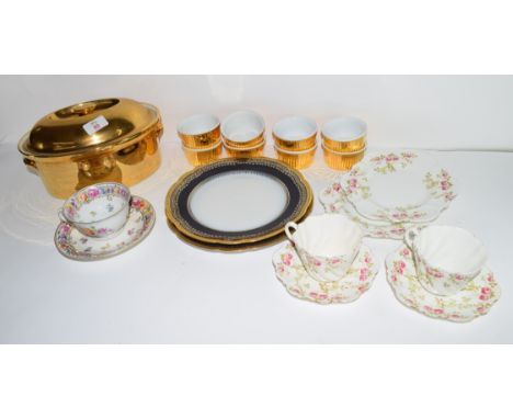Quantity of gilt decorated Royal Worcester ramekins, serving dish and cover and two Paragon china tea cups and saucers