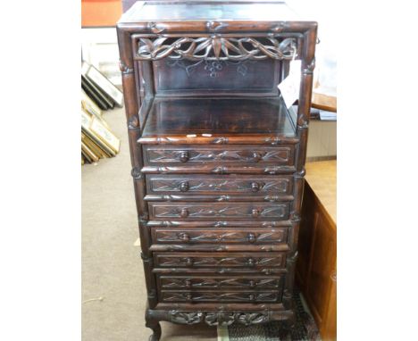 19th century Chinese carved hardwood cabinet (possibly Huanghuali rosewood) fitted with seven drawers below an open shelf, ha