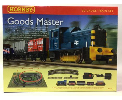 THREE HORNBY DUBLO MODEL TRAIN SETS, including Goods Master, Santa's Express and G.W.R FreightQty: 3