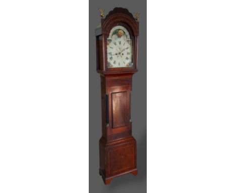 A 19th Century mahogany longcase clock, the arched hood with brass finials above a rectangular door with bracket feet, the pa