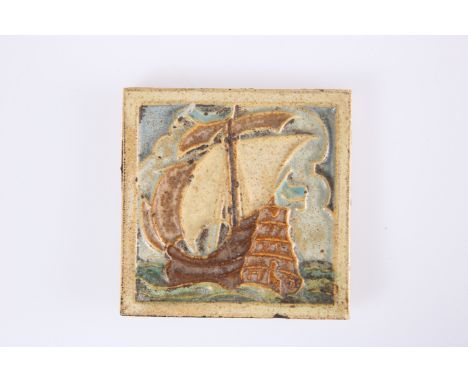 AN ARTS AND CRAFTS POTTERY TILE, PROBABLY AMERICAN, POSSIBLY GRUEBY OR ROOKWOOD, square, decorated in relief with a galleon i