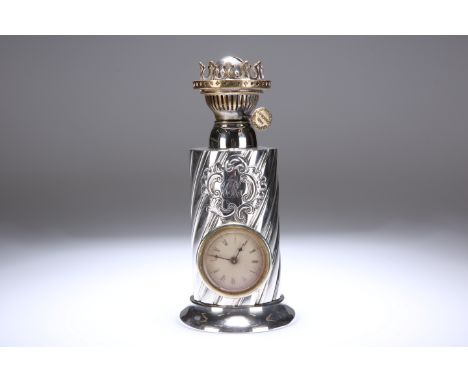 A LATE VICTORIAN SILVER OIL LAMP BASE, INSET WITH A CLOCK, JAMES DEAKIN &amp; SONS, SHEFFIELD 1889, of cylindrical form, chas