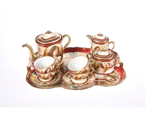 A VIENNA PORCELAIN CABARET SET, EARLY 20TH CENTURY, comprising teapot, covered cream jug and sucrier, four cups and saucers, 