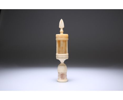 A VICTORIAN CARVED BONE SEWING CLAMP PIN CUSHION, the clamp with arrow-head terminal over a pierced urn-form thimble case and