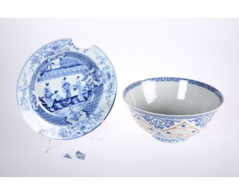 A CHINESE EXPORT BLUE AND WHITE PORCELAIN BOWL, late 18th century, decorated to the well with a lady and attendants (damage t